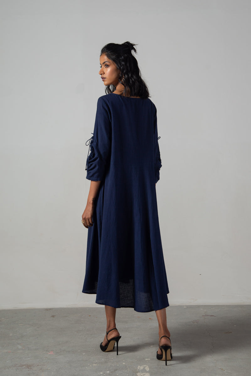 Blue dress with drawstring sleeves