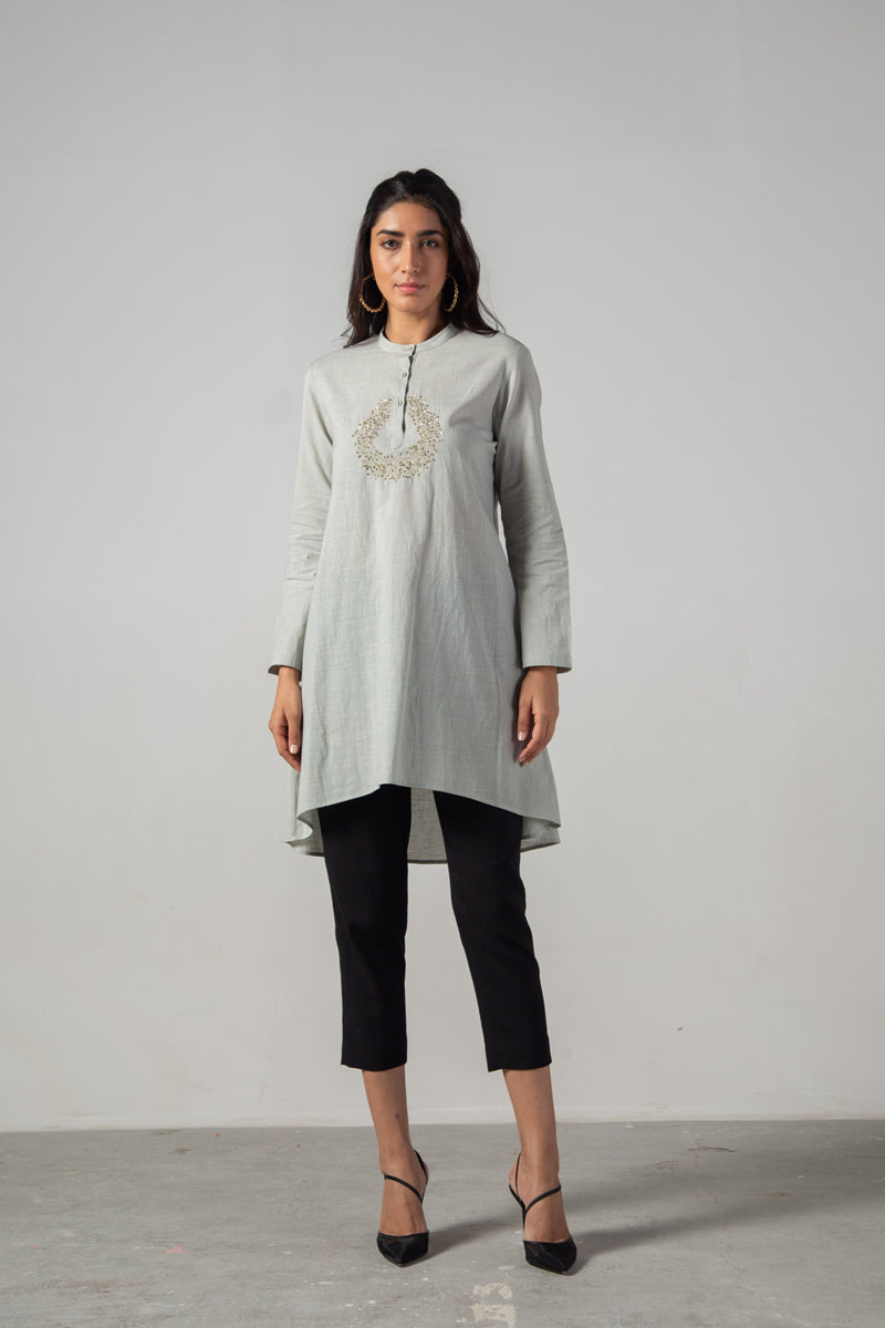Grey tunic.
