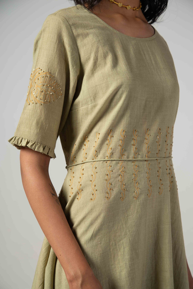Green dress with block print