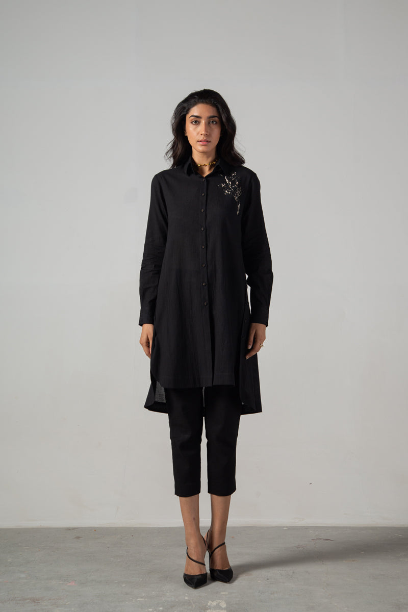 Black long side button shirt with front embroidery