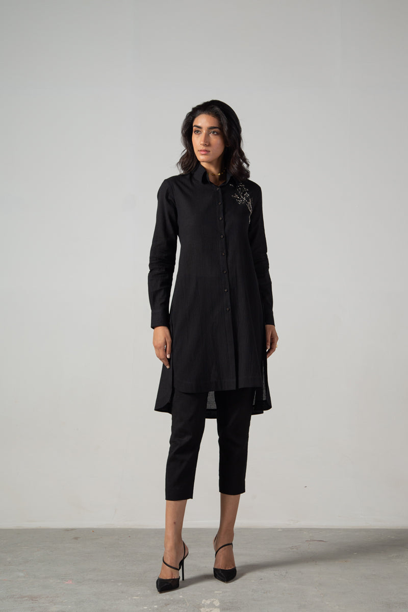 Black long side button shirt with front embroidery