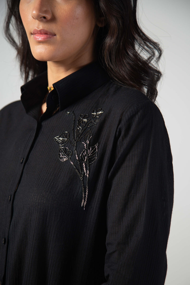 Black long side button shirt with front embroidery
