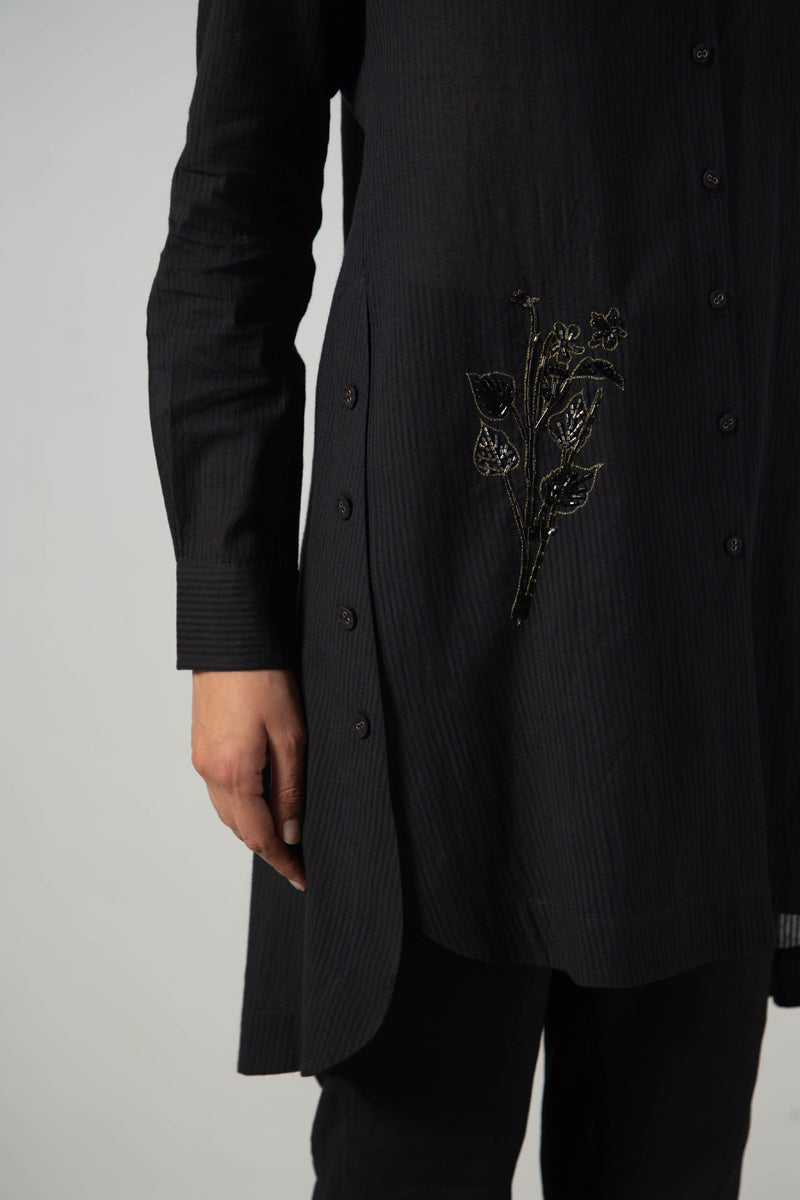 Black long side button shirt with bottom embroidery