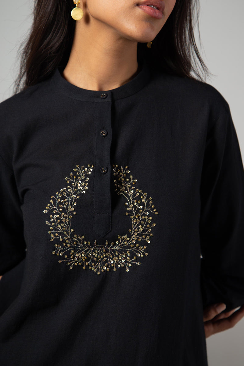 Black tunic.